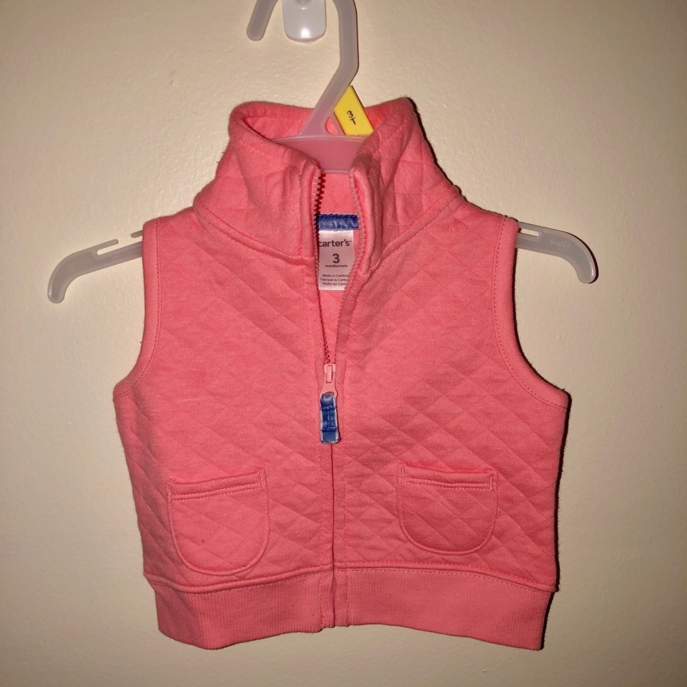 Baby girl pink vest .